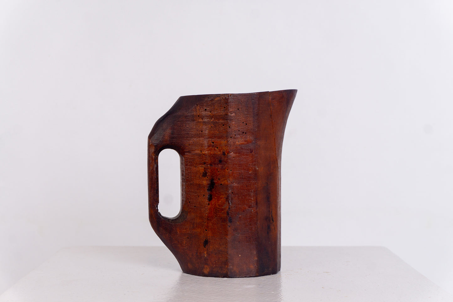 PRIMITIVE ROSEWOOD PITCHER