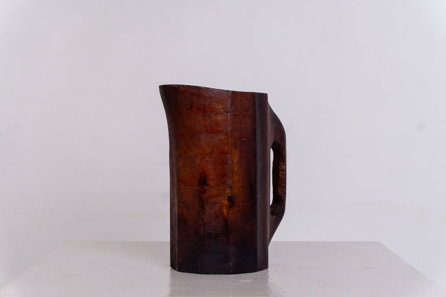 PRIMITIVE ROSEWOOD PITCHER
