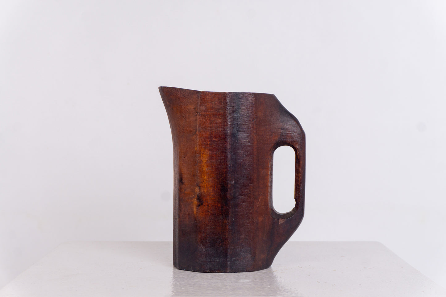 PRIMITIVE ROSEWOOD PITCHER