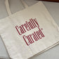 CAREFULLY CURATED TOTE BAG