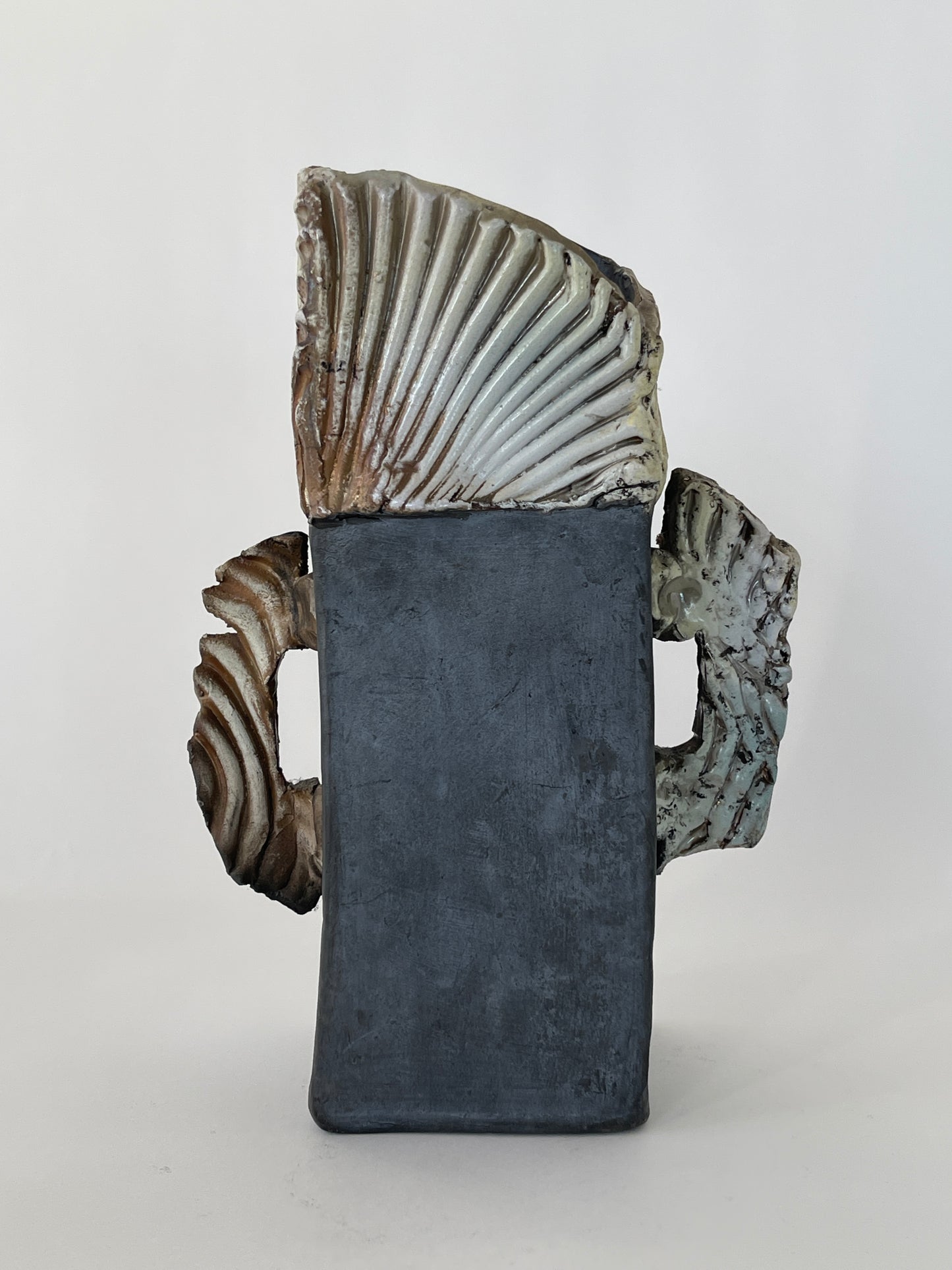 HANDLED ABSTRACT CERAMIC SCULPTURE